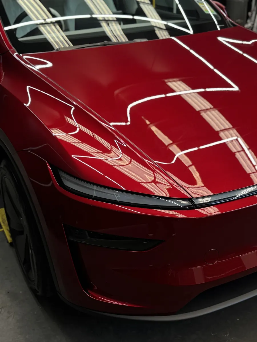 Deep gloss on a red Tesla Model Y at Xotic Customs Melbourne