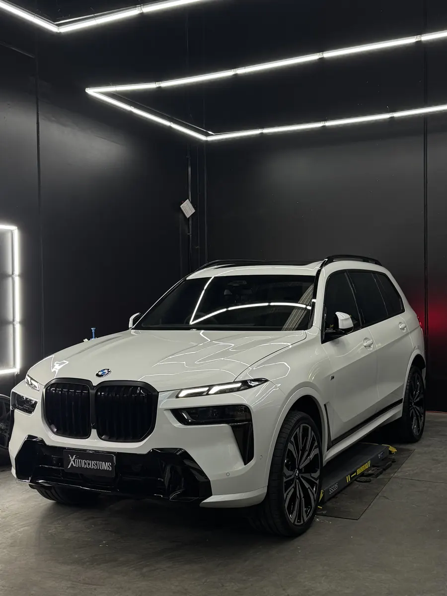 White BMW X7 in the Xotic Customs studio